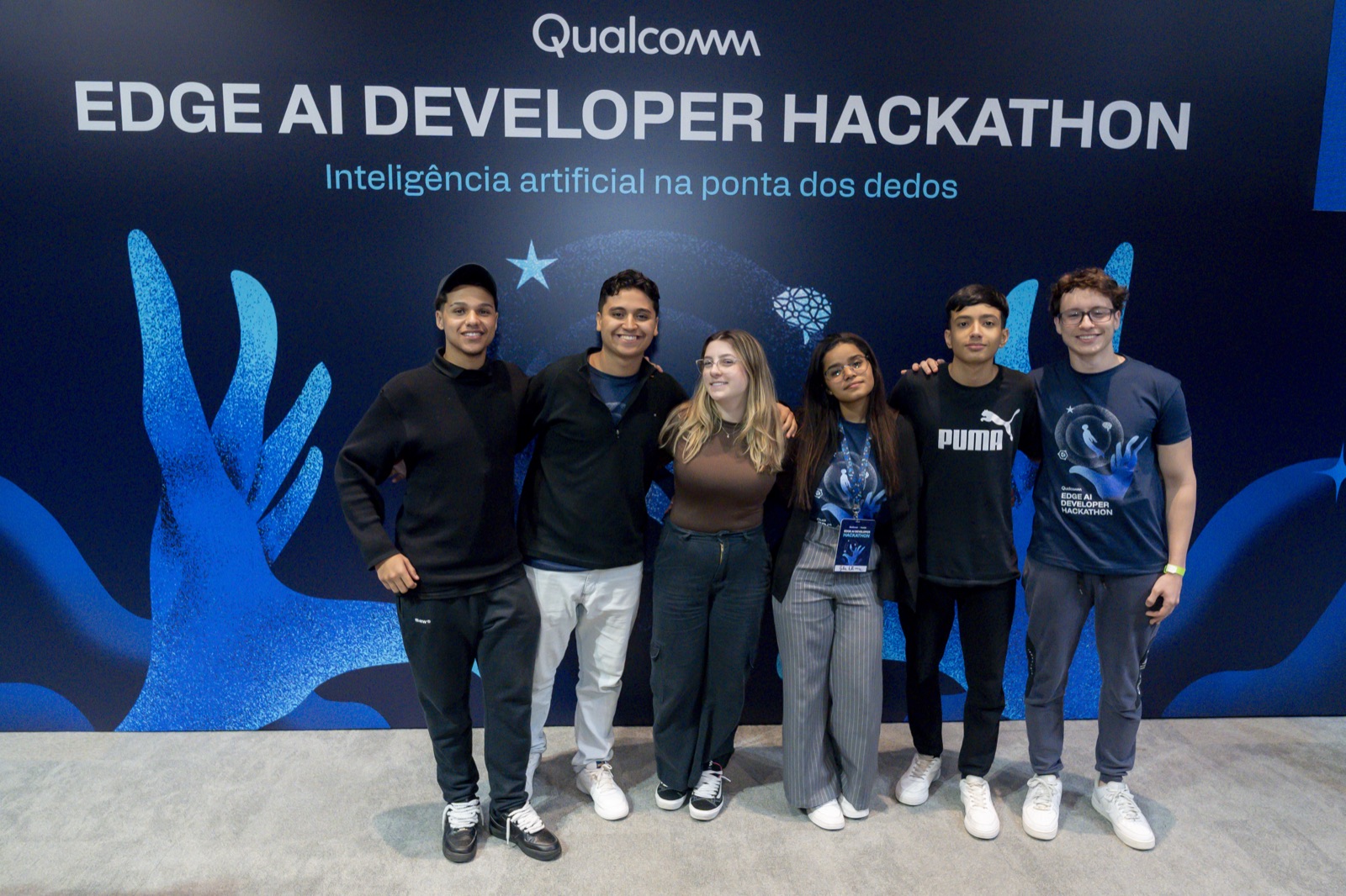 Diego working with teammates at the Qualcomm Edge AI Hackathon